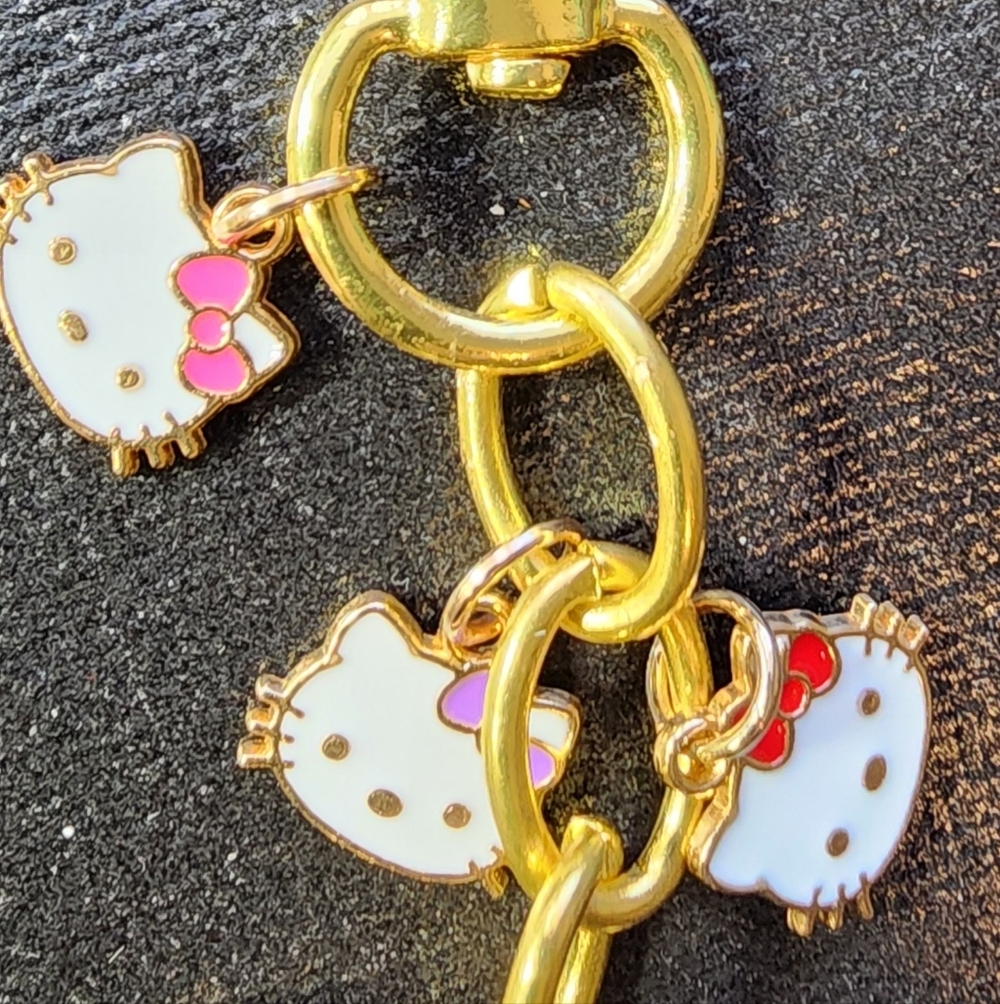 Hello Kitty Gold Tone Charm Keychain with White & Pink Accents
